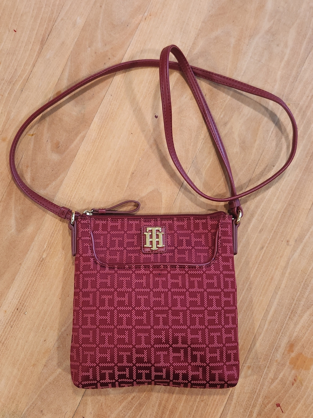 Tommy Hilfiger Monogram Jacquard Crossbody Bag featuring a burgundy/dark red